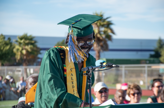Graduating student standing at podium