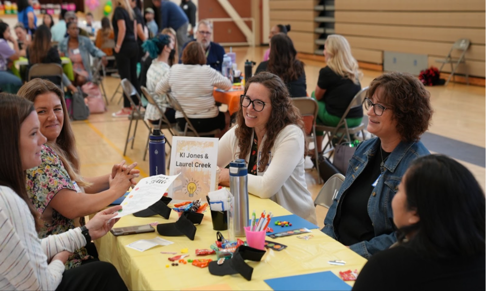 A group of ladies at a table talking