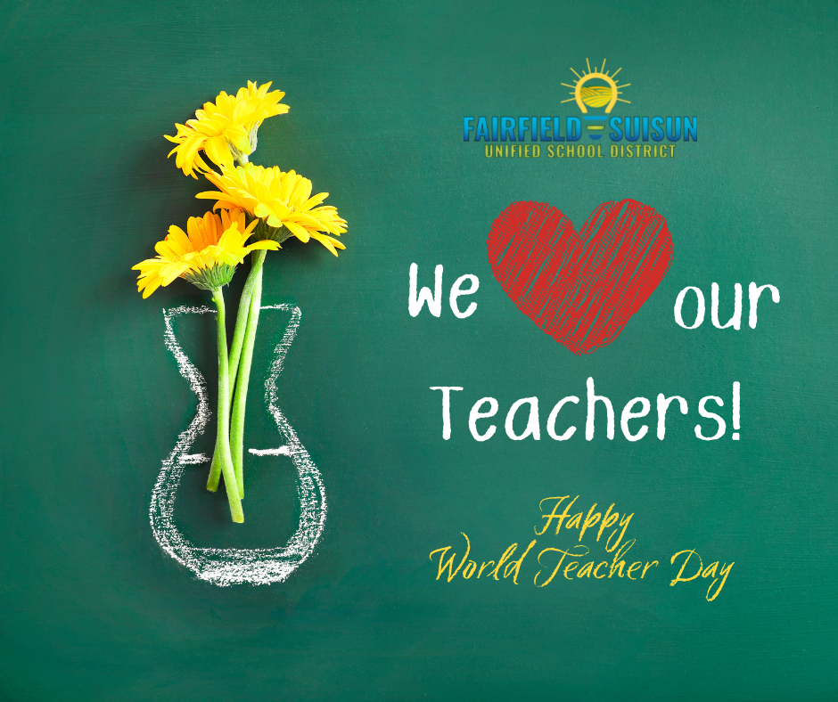 A flower on the left next to text that says we heart our teachers! Happy World Teacher Day